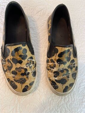 Coach Leather Leopard Print Slip-On Sneakers in Black and Gold